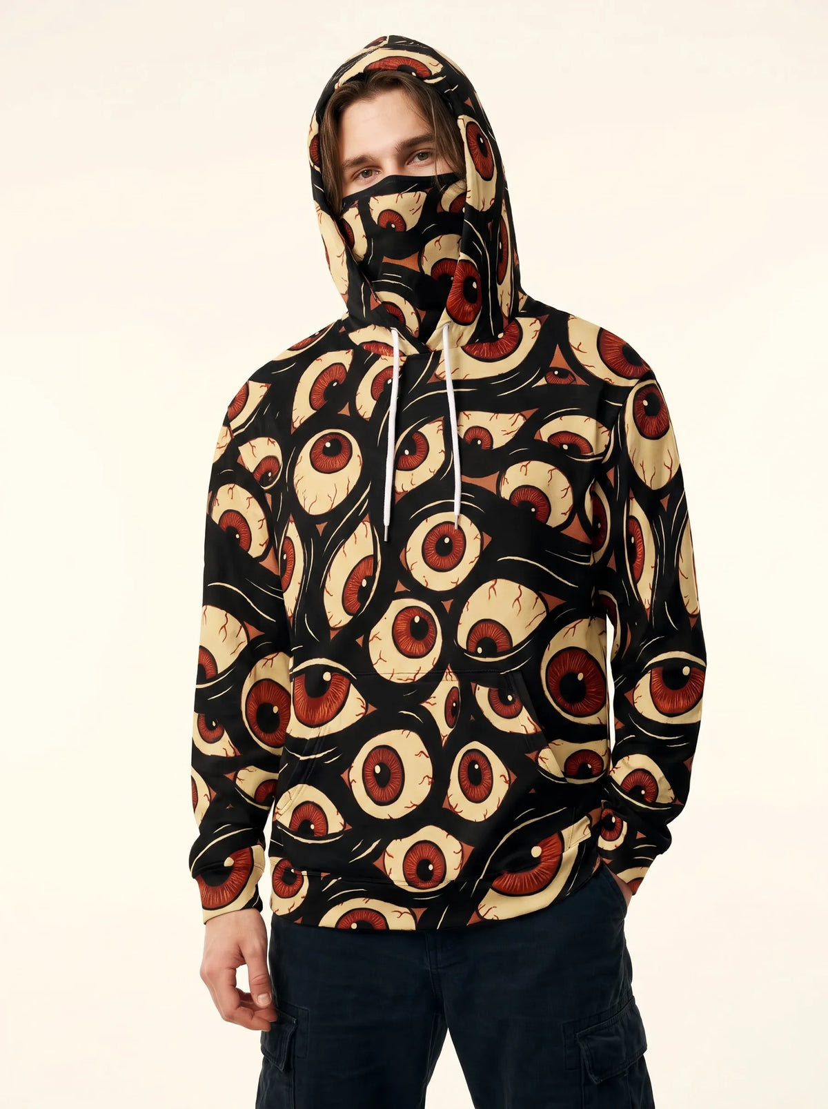 Close-up of a model wearing the Halloween Hoodie Trippy Eye Rave Shirt with the built-in gaiter mask pulled up for cold weather festivals.