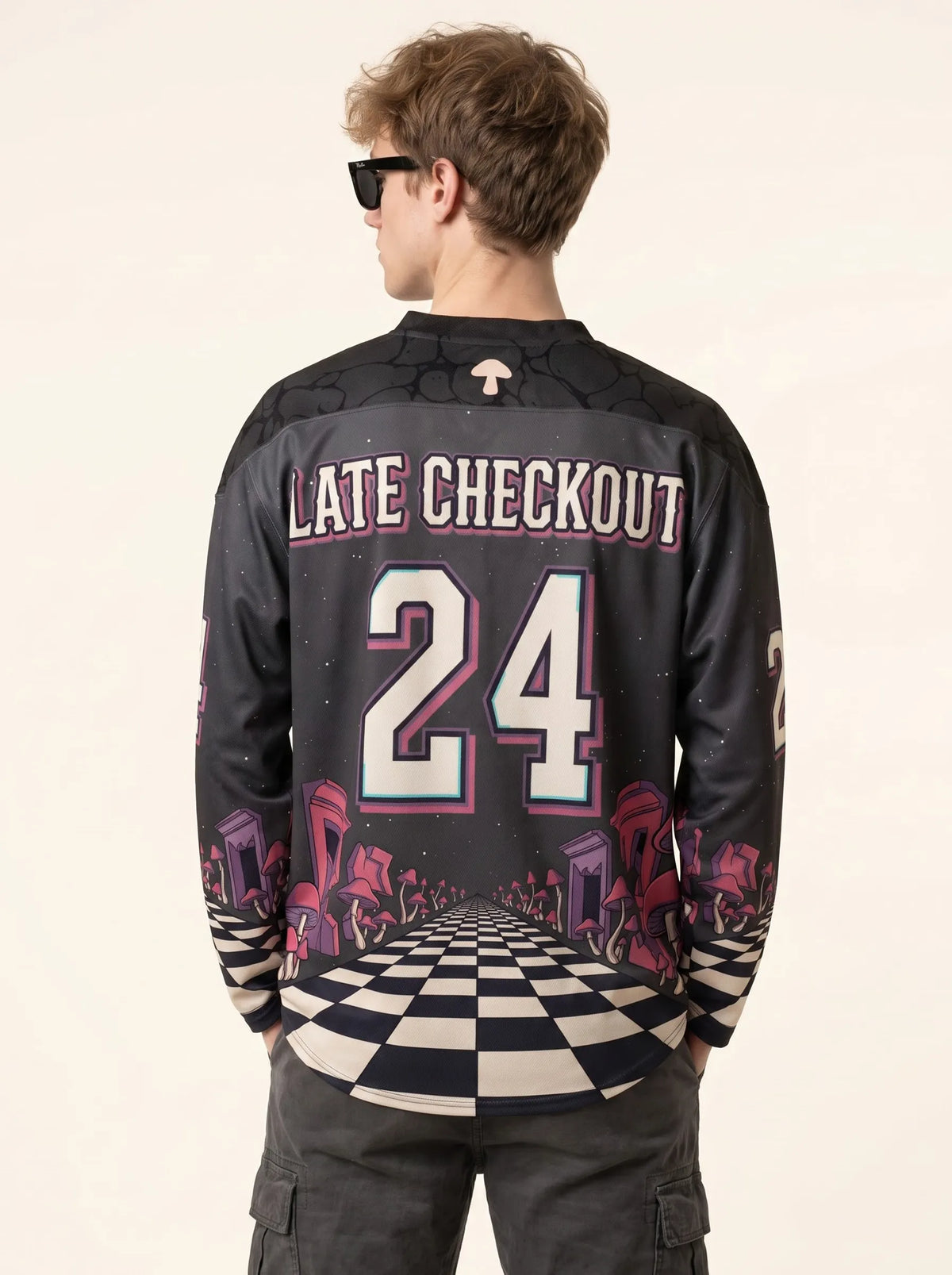 Male model showcasing the back design of the Mushroom Rave Hockey Jersey, featuring the large number 24 and deep space background.