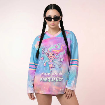 Woman modeling the Pastel-Galaxy-Rave-Hockey-Jersey-EDM-Top, which features a kawaii anime girl graphic and "Find Your Frequency" text over a pink and blue starry background.