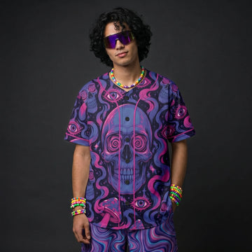 Male raver wearing the trippy skull mesh EDM outfit, styled with colorful kandi bracelets and retro sunglasses for a complete festival look.