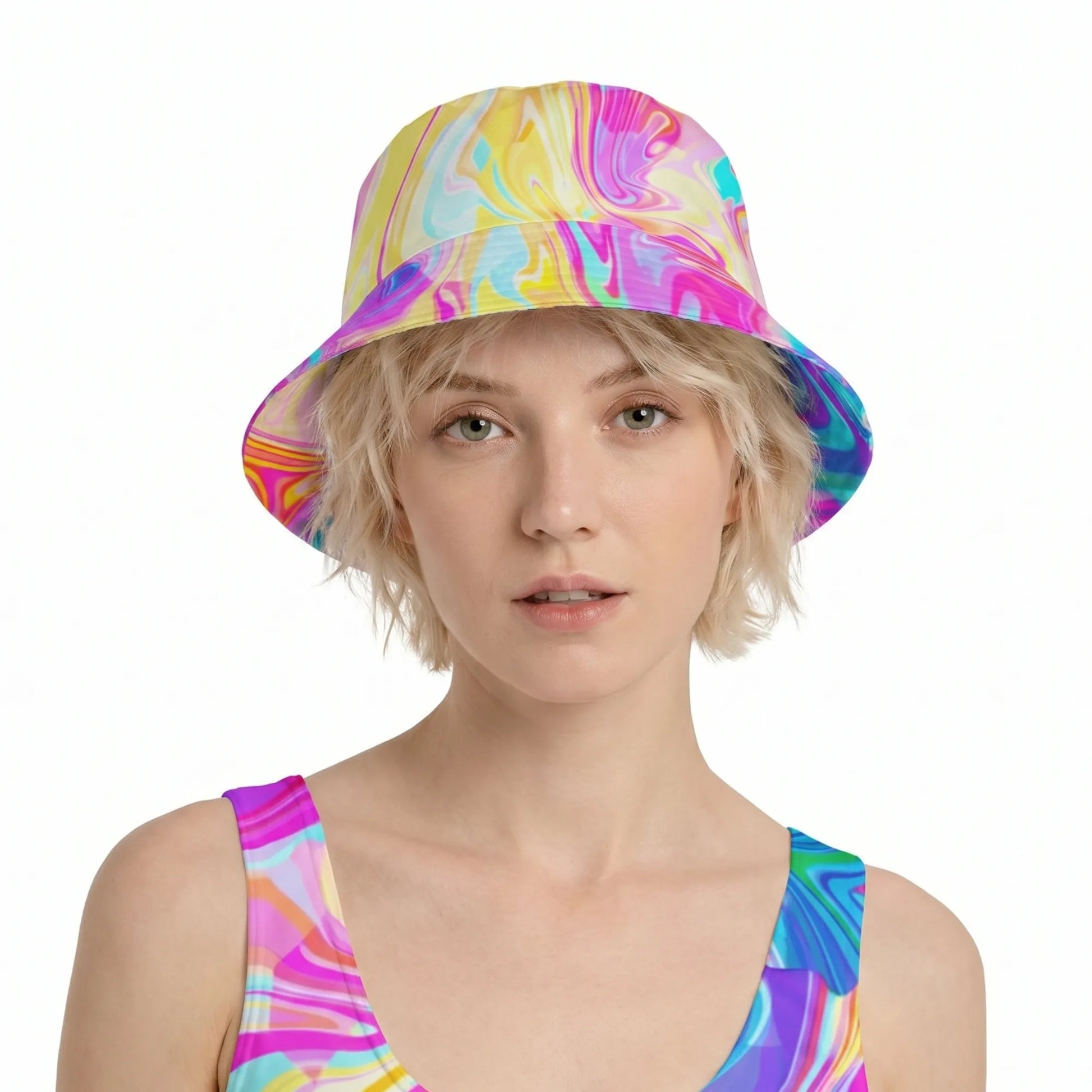 Front view of a blonde model wearing the Psychedelic Swirl Festival Headwear bucket hat paired with a matching neon rave outfit