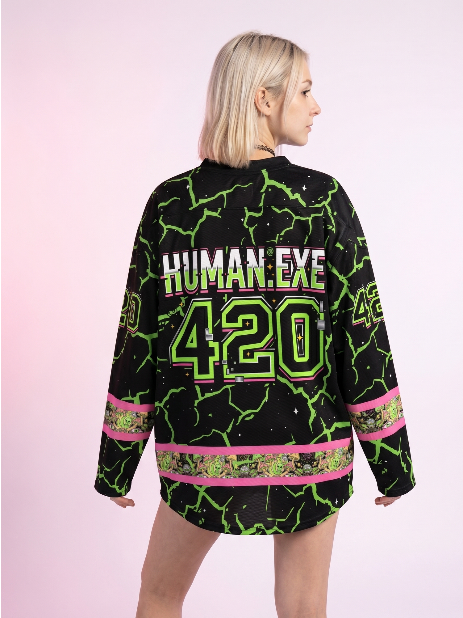 Back view of a woman wearing the oversized 420 mesh rave hockey jersey featuring neon green Human.exe graphics