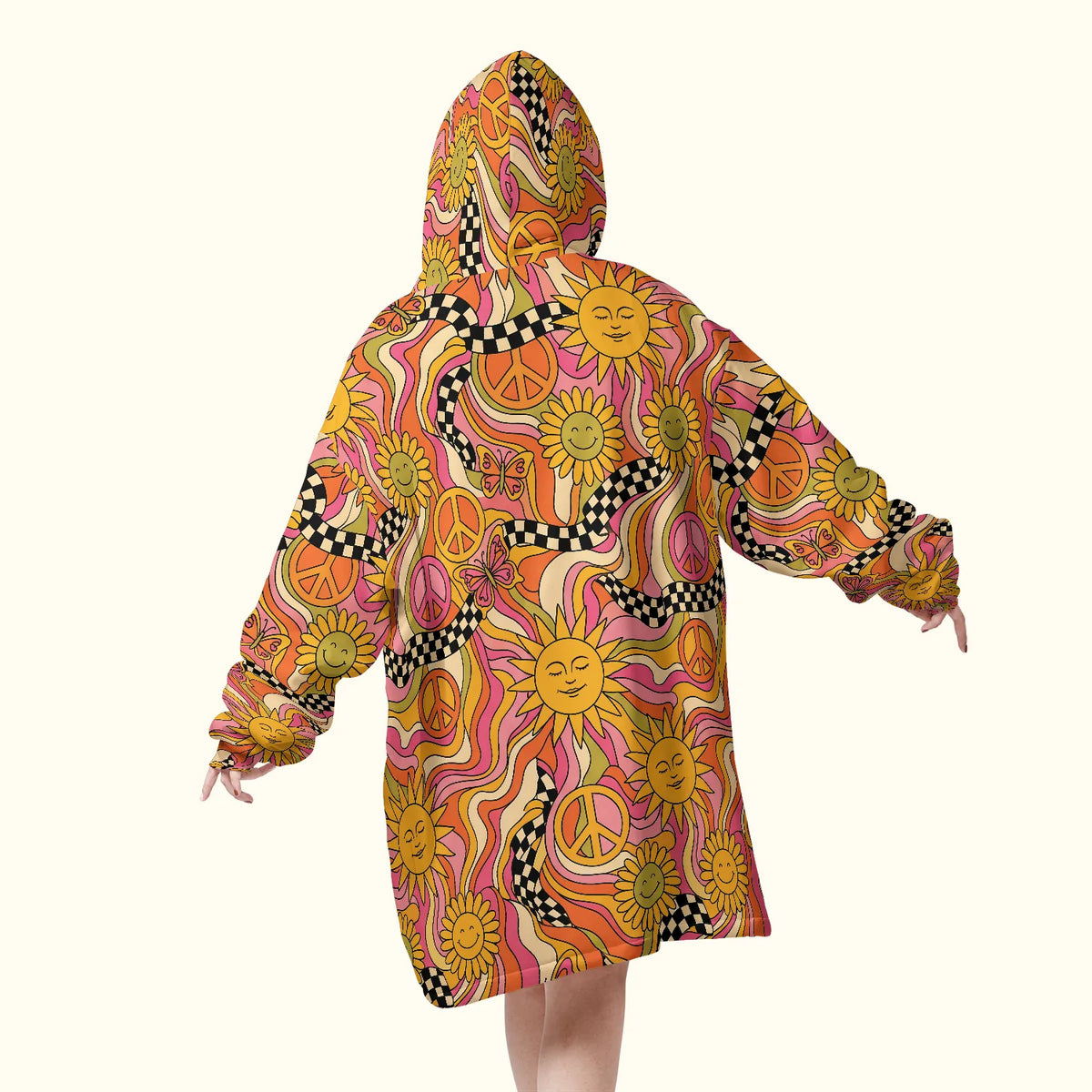 Back view of a vibrant trippy blanket hoodie showing melting checkerboards and 70s peace sign graphics for festival and rave hippie outfits