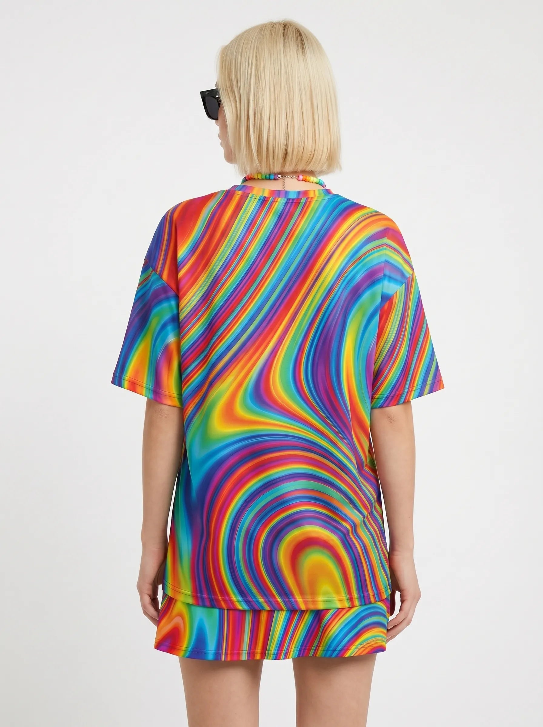 Back view of the Trippy Rave T Shirt, showcasing the seamless, psychedelic rainbow swirl design on this fade-proof festival top.